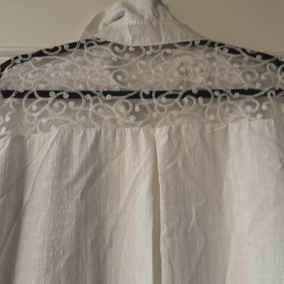 Classic white shirt with a twist…lace sleeves and across back at shoulders. - Picture 4 of 4